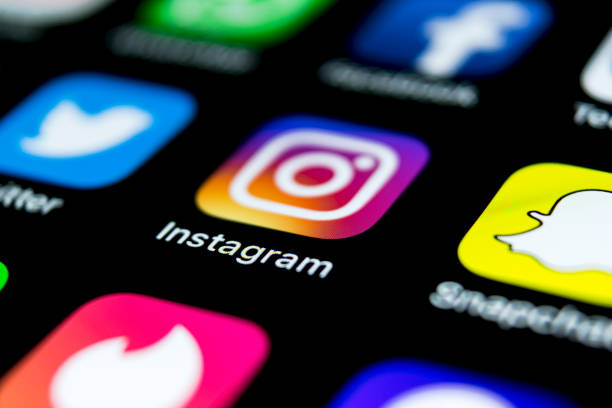 Smartphone showing Instagram and other social media app icons